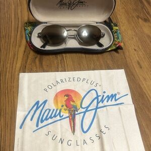 Maui Jim Oval Sunglasses with Silver Frames and expresso Lenses Maui jim italy